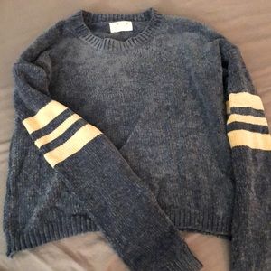 Blue sweater with white stripes